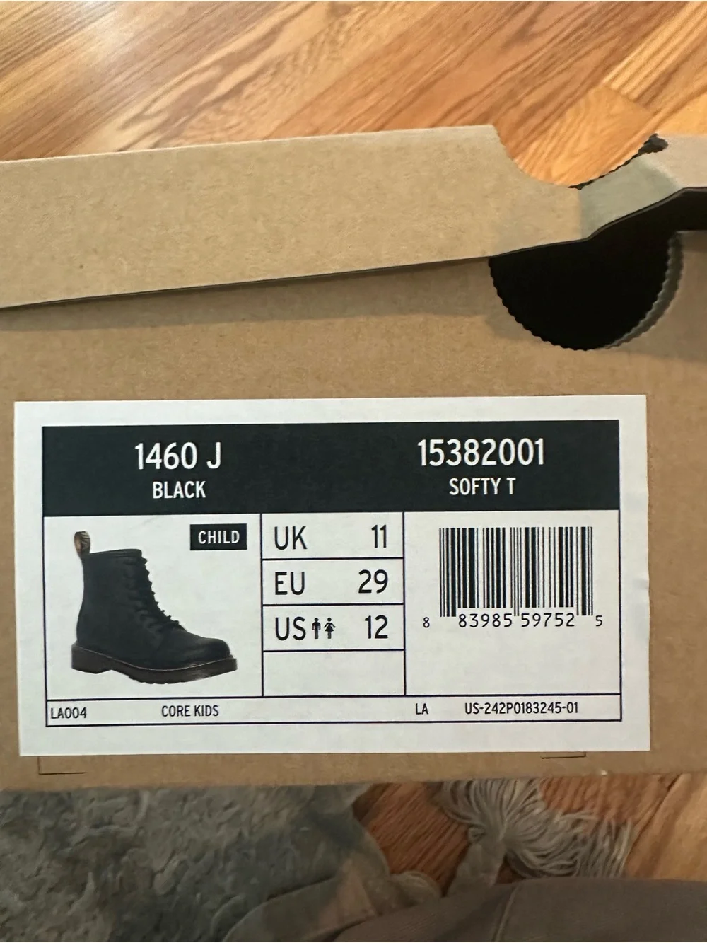 Kids Dr. Martens Black Leather 8-Eye Lace-Up Boots with Yellow Stitching